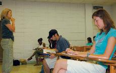 Rachel Benoit, a senior from Thibodaux High School, takes notes on good speech writing as part of the Dual Enrollment program that, starting this summer, allows high school seniors to take classes at reduced prices. 