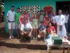 The St. Thomas mission team poses after finishing painting a house that was funded by St. Thomas. Pictured left to right are Travis Beyer, Darin Branson, Anne Blanchard, Freshman from Raceland, Lynette Boudreaux, Michele Beary, Lauren Beary, Amy Shows, bu