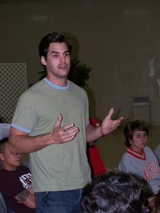 Clint Schexnyder, general studies senior from Houma, speaks for the con side at the speech forum held in the Cotillion Ballroom Tueday night.
