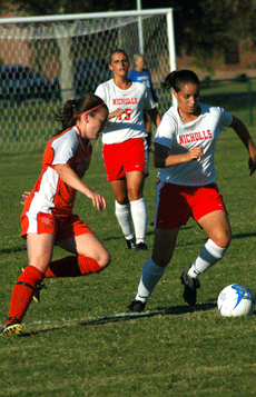 Senior midfielder/forward Tori Priddy runs past Sam Houston State defender with the support of sophomore defender Denise Prewett during the Sept. 29 game.