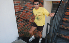 Tim Mead, associate professor of health and physical education, runs up stairs outside of Ellender Hall. Mead recently placed 30th in a stair climbing competition.