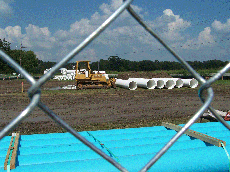 A construction site located near La Maison du Bayou apartments off Bowie Road is set up to begin building new residence halls. The residence halls are set to be complete by Aug. 1, 2008.