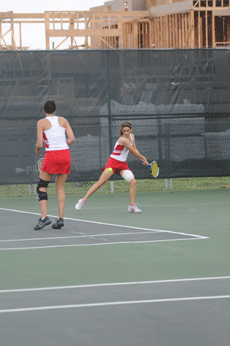 Senior Anne-Claire Murier and freshman Nataila Zamora play a match against Texas Pan-American Feb 22. at the Nicholls tennis courts.