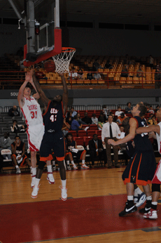 Freshman guard Anatoly Bose attempts a jump shot during the Feb. 16 game against the University of Texas-San Antonio Roadrunners in Stopher Gym.