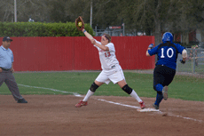 Senior first base Amy Thibodeaux catches the ball in an attempt to make an out against University of Texas-Arlington March 2.