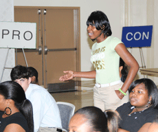 Jessica Jones, freshman from Marrero, speaks against random drug testing in public schools and universities Monday night in the Cotillion Ballroom.  