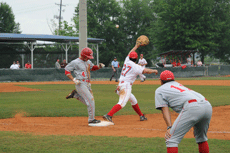 Sophomore infielder Keith Kulbeth safetly reaches first base during the Saturday game against Lamar at Didier Field.