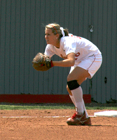 Freshman third baseman Tori Lay crouches to wait for a hit during the April 12 game against Stephen F. Austin at the Colonel Softball Diamond/500.