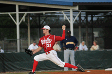 Senior pitcher Nathan Quebedeaux winds up to throw a pitch a Southern batter during the April 9 game in Didier Field.