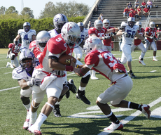 Senior quarterback Vincent Montgomery is tackled during the Nov. 1 Homecoming football game against University of Central Arkansas in Guidry Stadium.
