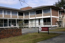 A Quad side view of Beauregard Hall shows the stairway that will be removed during renovation and the window frames in which energy efficient windows will be installed. Renovations expected to end in late March 2010.