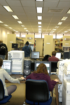 Students use computers on the second floor of Ellender Memorial Library.