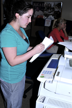 Sarah Beal, culinary and dietetics junior from Slidell, printed out some papers for class on Feb. 16. Students printing quota was reduced from 250 pages to 100 pages at the beginning of the spring semester. The quota was reduced to reduce expenses from p