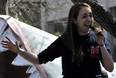 Rachel Lecompte, art senior from Houma voices her concerns about future budget cuts in front of the Student Union on Feb. 12.