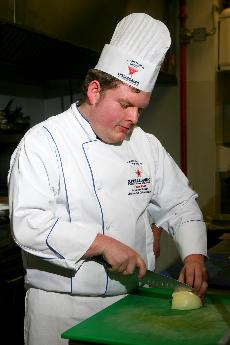 Jason Flato, culinary junior from Mandeville and winner of South Central Region San Pellegrino Almost Famous Chef Competition, works in the John Folse institutes kitchen.