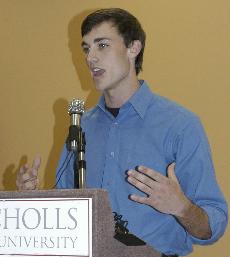 Ryan Donegan, SGA vice president, presents his platform to the student body at the candidate forum in the Student Union snack bar Wednesday.