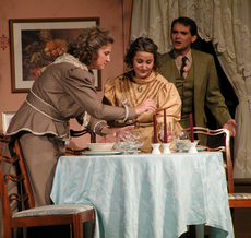 Jeannette Burke, general studies senior from Houma, Laura Templet, English senior from Raceland, and Joey Pierce, English senior from Raceland, rehearse a scene from Arsenic and Old Lace Monday in Talbot Theater.