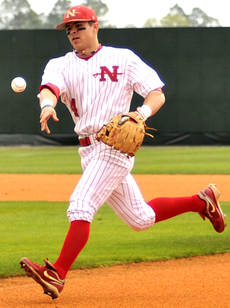 Junior second baseman Keith Kulbeth tosses the ball for an out.