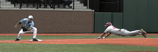 Junior Keith Kulbeth dives into third base on Tuesdays game against the Green Wave of Tulane University. The Colonels lost the match-up with a score of 15-2.