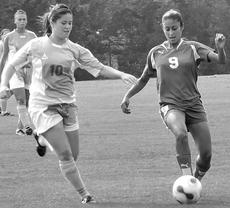 Sophomore midfielder Alana DeHart races after the ball during last Fridays game against Southern Miss.  The game marked the Colonels first season win.