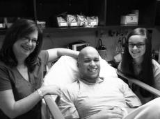 Grant Hebert sits in his hospital bed with  his mother, Malissa, and his sister, Morgan. He is scheduled for a bone marrow transplant Sept. 26. Morgan will be Heberts bone marrow doner.