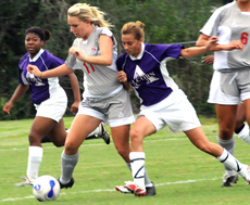 Freshman defender Britni Crone guards the ball against Alcorn State players during Tuesdays game.  The Colonels won 6-0.