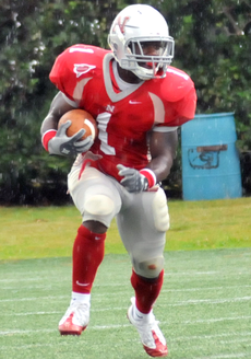 Senior running back A.J. Williams runs the ball during the Sept. 12th game against Duquesne.