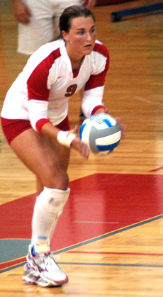 Senior outside hitter Manieka Golden prepares to serve the ball during the October 9th game against Stephen F. Austin.  The Colonels won 3-2.