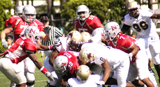 The football team has a pile-up during the October 17th game against Texas State.  The Colonels lost 34-28.