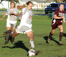 Junior midfielder/defender Gillian McCarter (20) takes possession of the ball during the October 16th game against Texas State.  The Colonels lost 3-1.