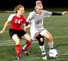 Junior forward Kaity Mattsson tries to take control of the ball during Fridays game against Lamar.  The Colonels lost 3-2.