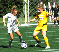 Senior midfielder Jessica Bedford takes the ball at the game against McNeese on Sunday.