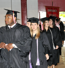 Graduates enter Stopher Gymnasium May 23rd for the spring 2009 commencement ceremony.
