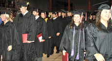 Graduates proceed out of Stopher Gym after the fall commencement ceremony December 12th.