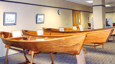 Pirogues are displayed on the first floor of Ellender Memorial Library.  The display is part of a collection dedicated to preserving the states boat-building heritage.