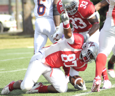 Junior defensive lineman Marquis Russell signals that he has the ball after being tackled during the Nov. 14 game against Northwestern State.  The Colonels won 28-21.