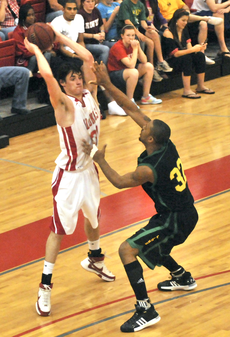 Junior guard/forward Anatoly Bose tries to get past a Southeastern player during the 2008-2009 season.