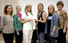 Colonels for Life representatives pose with a $500 check from the Louisiana Organ Procedure Agency on Monday in Ayo Hall. From left, Jan Thomas, assistant professor of nursing; Carly Joffrion, nursing junior from Houma; Katelyn Laskey, nursing senior from