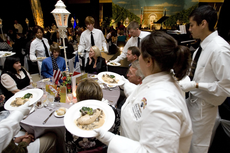 Guests are served at the John Folse Culinary Institutes Bite of the Arts fundraiser last year in the Cotillion Ballroom.