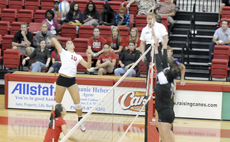 Sophomore outside hitter Jennifer Brandt jumps to spike the ball during last weeks game against Central Arkansas.