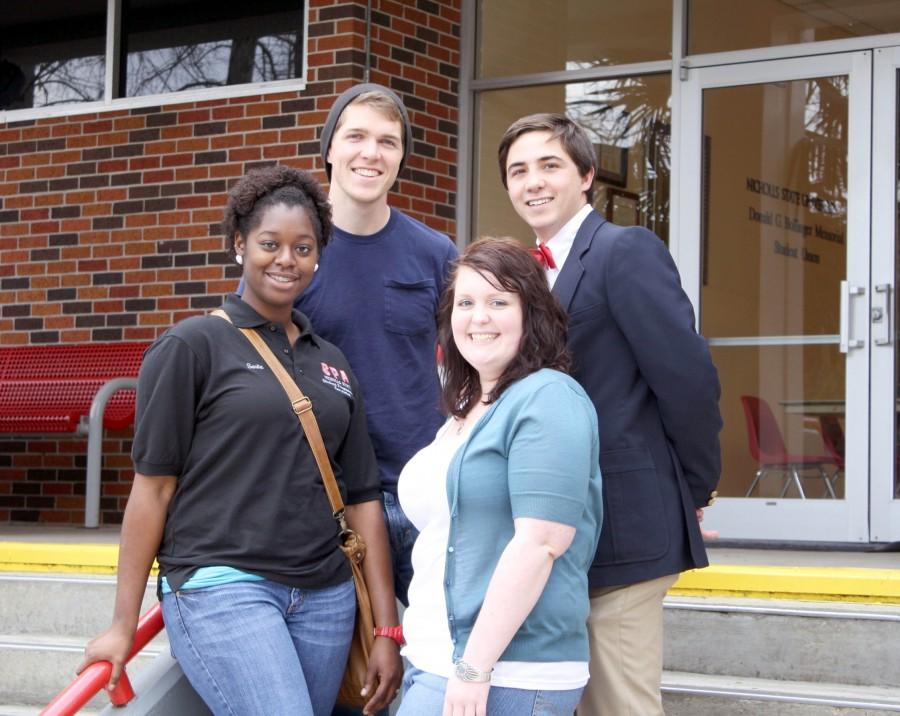 SPA president Sarita Jones and vice president Johnathan Lynch pose with SGA president Brittany Taraba and vice president John Lombardo on Monday in front of the Student Union.