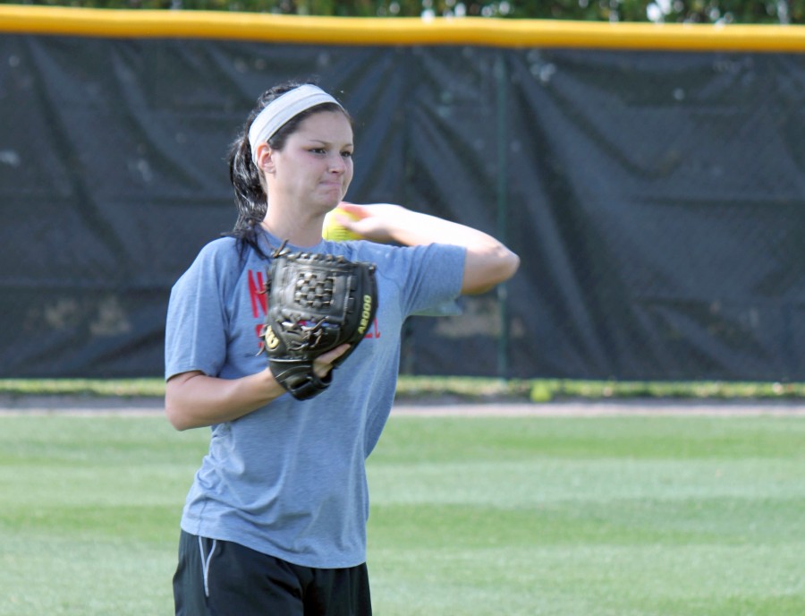 Junior left-handed pitcher Lauren Crane warms up during practice on Monday at the softball field.