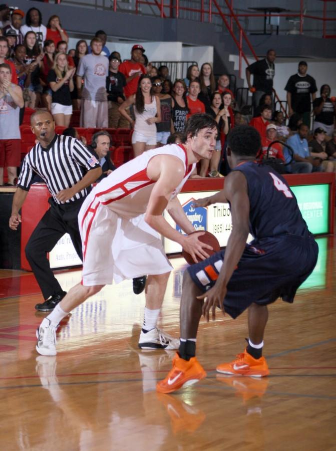 Senior guard/forward Anatoly Bose tries to get past a University of Texas at San Antonio player during the Feb. 19 game.