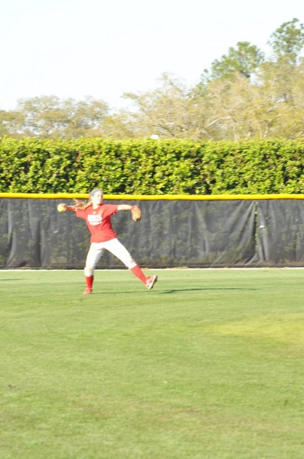 Junior outfielder, Megan Gaspard from Coteau, LA tosses a ball in from center field at practice on Thursday, March 10th.