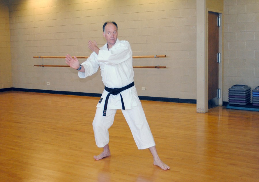 Karate instructor Jimmy Ellis demonstrates a stance during the Karate Club’s meeting on Tuesday in Shaver Dance Studio.