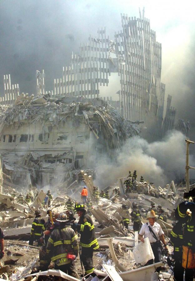 A+shell+of+what+was+once+part+of+one+of+the+twin+towers+of+New+York%E2%80%99s+World+Trade+Center+rises+above+the+rubble+that+remains+after+both+towers+were+destroyed+in+the+terrorist+attacks+on+Sept.+11%2C+2001.