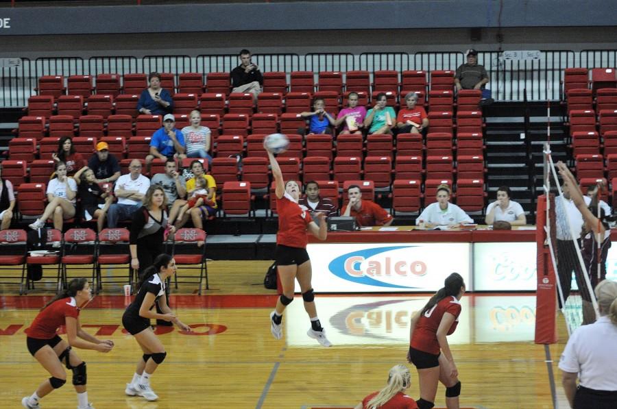 Volleyball+player+Kathryn+Stock%2C+junior+from+Thibodaux%2C+goes+up+to+spike+the+ball+at+Saturday%E2%80%99s+tournament+hosted+by+Nicholls.