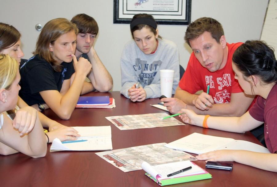 Members of the Nicholls Nation, a new student organization dedicated to promoting school spirit, meet with founder Andrew Kearney on Feb. 21 in the Office of Development in Candies Hall.  From left, Hillary Clark, freshman from Tallahassee, Fla.; Jake Martin, print journalism sophomore from Vidalia; Lacey Angeron, broadcast journalism junior from Patterson; Andrew Kearney, higher education graduate student from Stanton, Mich.; and Katelyn Thibodeaux, print journalism and public relations junior 