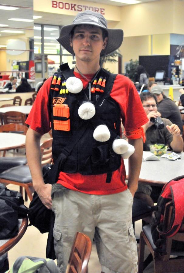 Brandon Cole, culinary arts junior from Jonesboro, shows off his Humans vs. Zombies gear Oct. 26, 2010 in the Student Union.