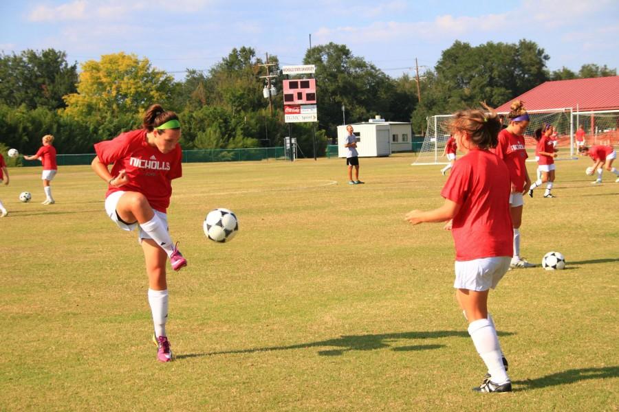 Defender Christina Bilczuk #27 from Ontario, Canada traps the ball after her teammate passed it to her during a drill at practice on Tuesday.